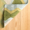 Safety Net Green Handwoven Wool Rug